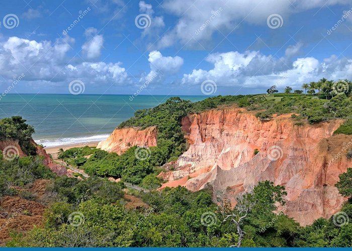 Taipe Beach Orange Cliff in the Middle of the Forest and Facing the Sea ... photo