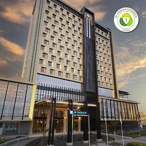 Wyndham Opi Hotel Palembang Exterior photo