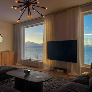 See Northern Lights From The Living Room Tromso Exterior photo